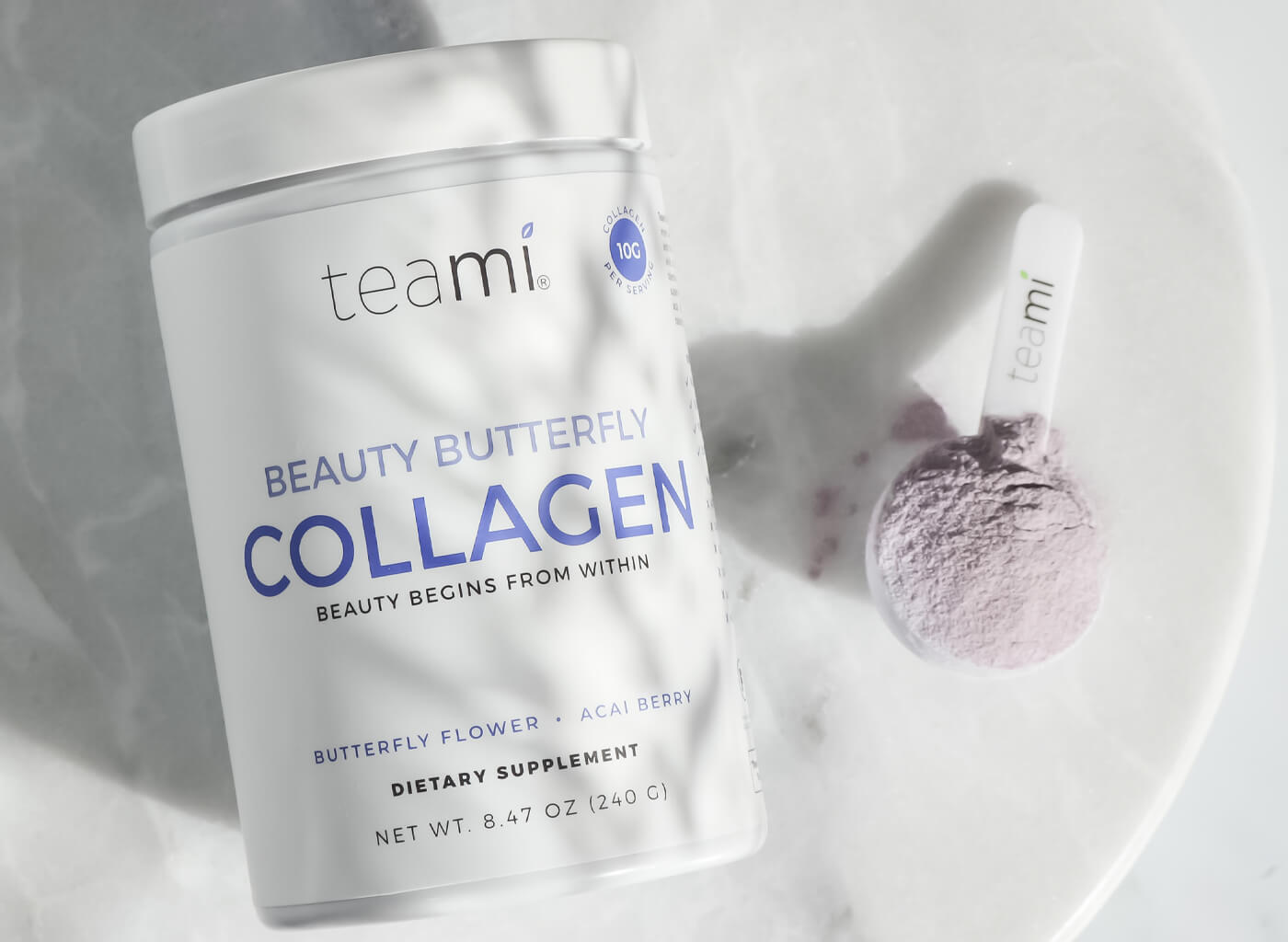 Teami Beauty Butterfly Collagen tub on marble surface