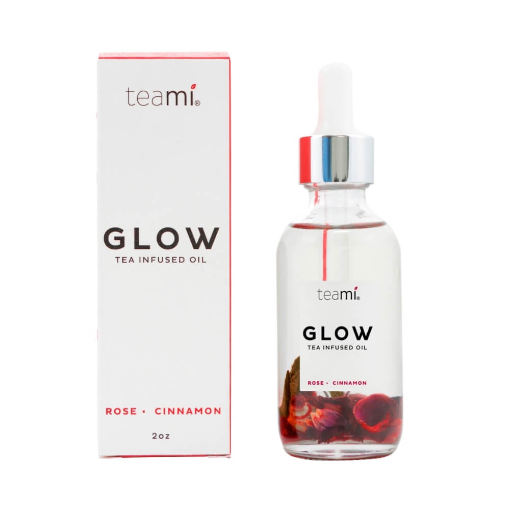Teami glow oil next to packaging box