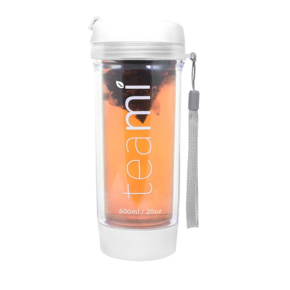 white teami tea tumbler filled with tea