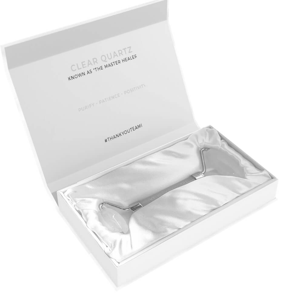 Teami clear quartz facial roller in packaging box