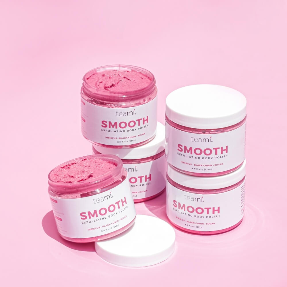 Multiple pots of Teami smooth body polish pot on pink background