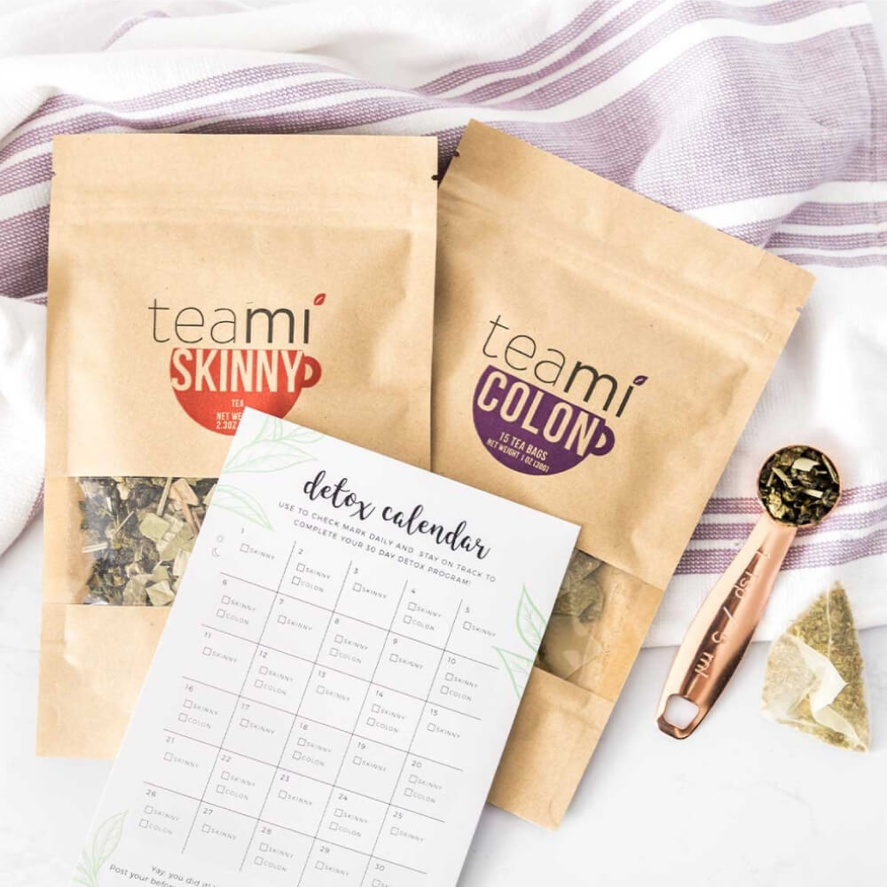teami skinny, teami colon and detox calendar on a kistchen towel