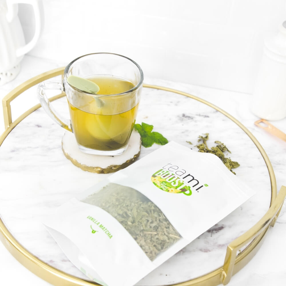 Teami boost tea package and glass of tea