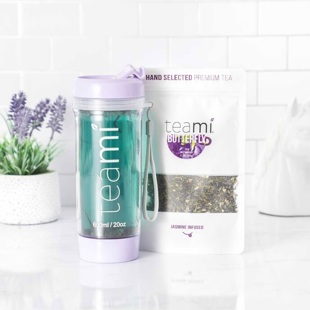 teami butterfly tea package and brewed tea in a tumbler