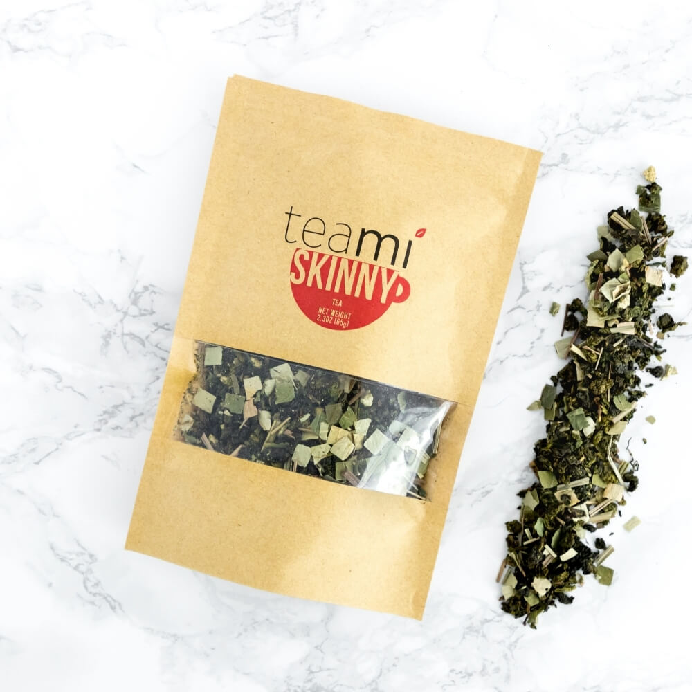 teami skinny tea package next to loose tea