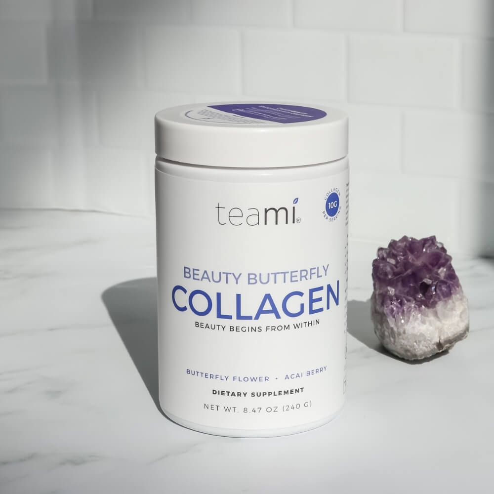tub of Teami beauty butterfly collagen lying on marble surface