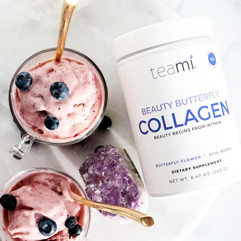 tub of Teami beauty butterfly collagen lying on marble surface