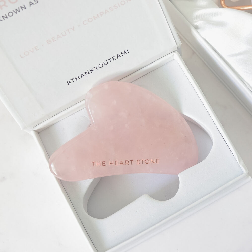 Teami Gua Sha rose quartz facial lifting tool in box